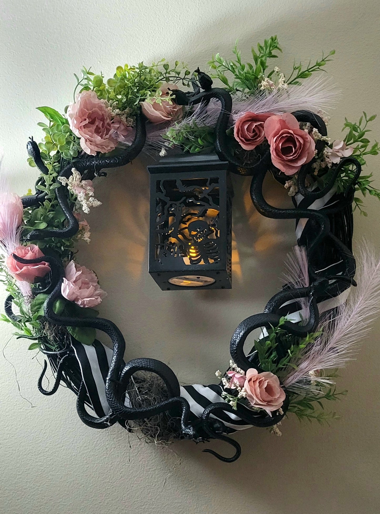 Captivating Pink Snake Charm Halloween Wreath
