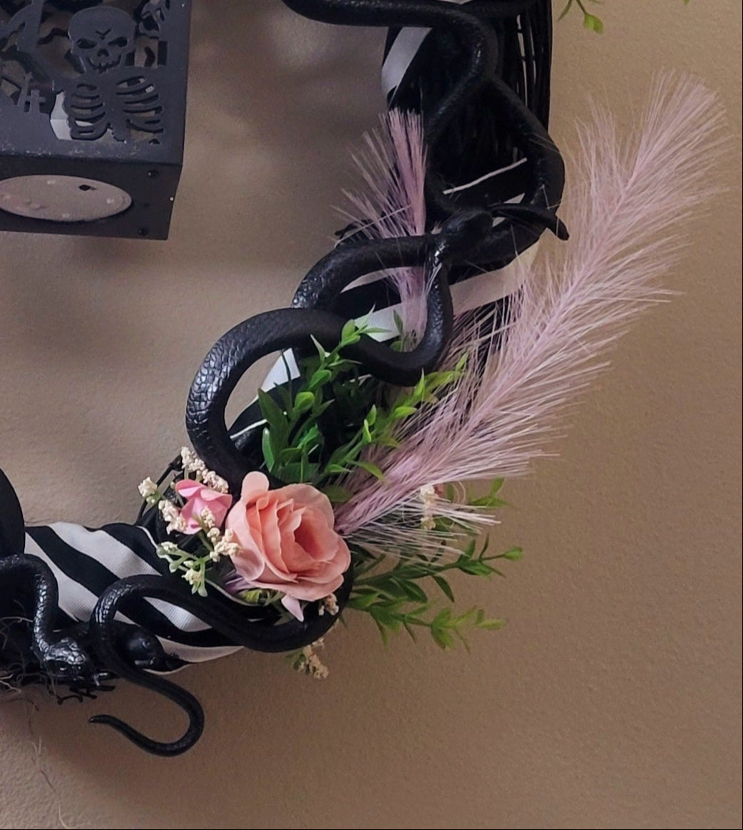 Captivating Pink Snake Charm Halloween Wreath