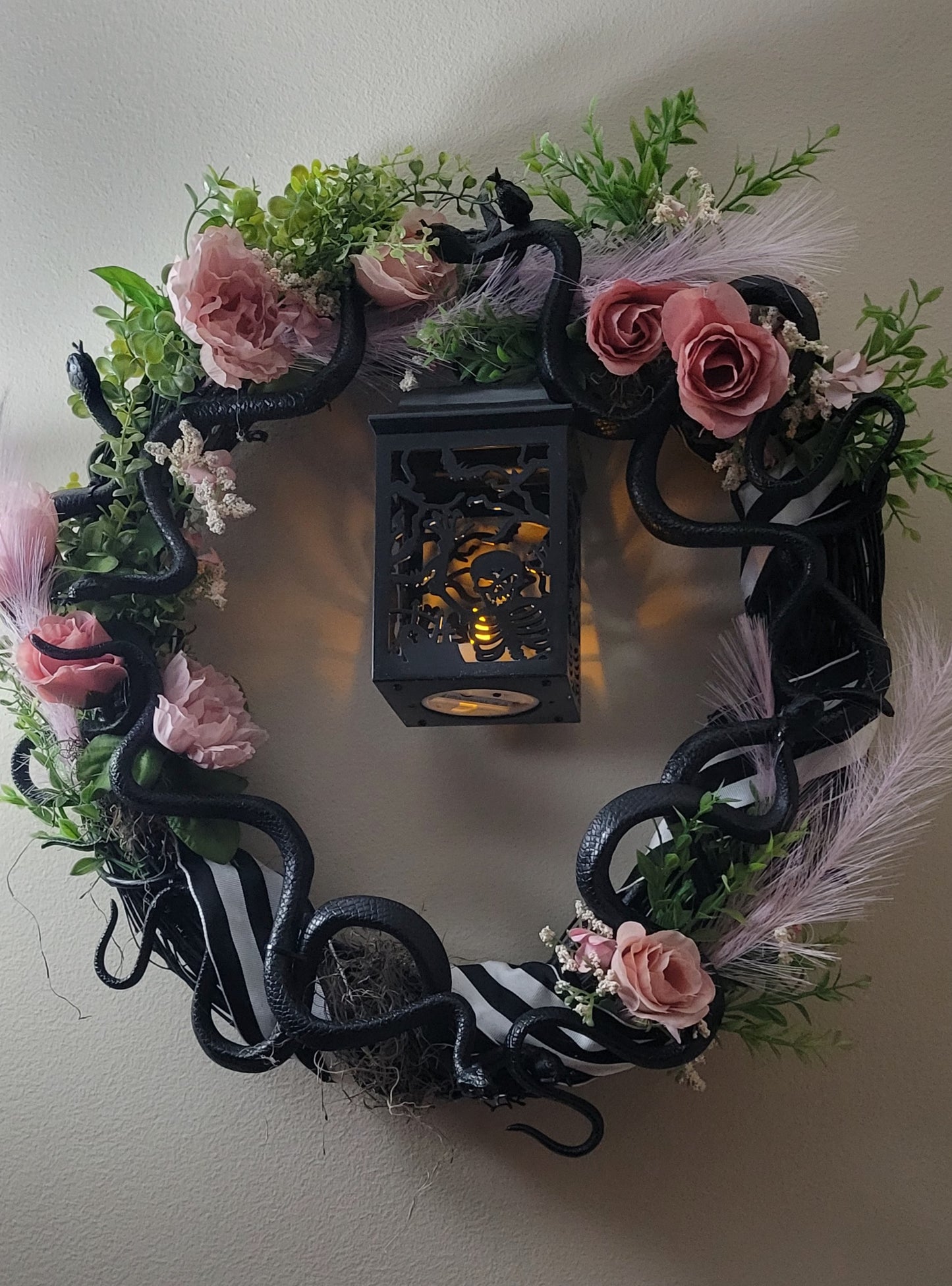 Captivating Pink Snake Charm Halloween Wreath