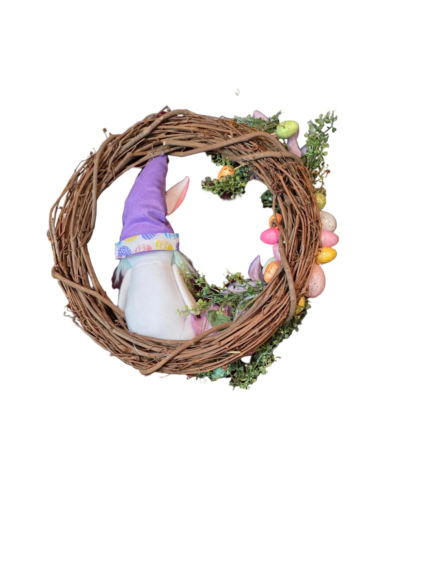 grapevine wreath with Easter eggs on a maroon cloth, back of bunny gnome